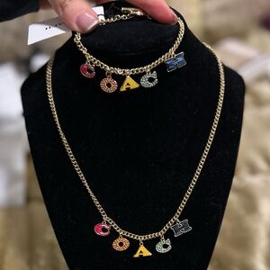 NWT! COACH Rainbow/Gold Logo Charm Necklace and Bracelet Set